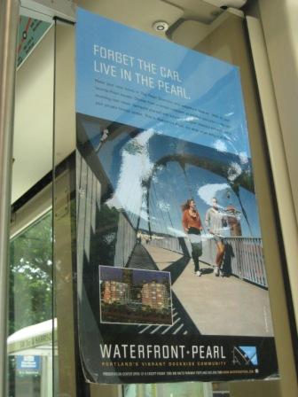 A condo ad on the Portland Streetcar