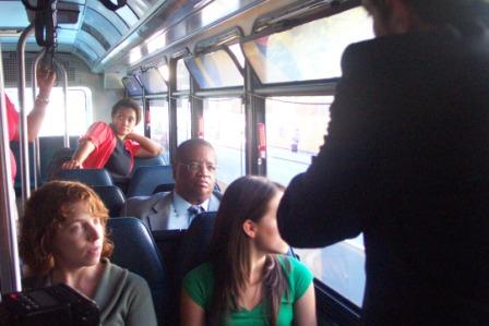 Larry Gossett on the partially wrapped trolley