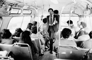 Bobby Seale, campaigning on a bus (source: NPR)